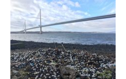 Nurdle pollution next to the Forth road Bridge, UK